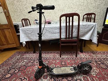 elektrikli scooter tap az: Az islenib, yeniden az ferqi var Şəhərdaxili rahat hərəkət üçün — 2