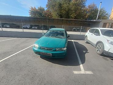 mbe group: Mazda 323: 1998 г., 1.5 л, Механика, Бензин, Седан — 2