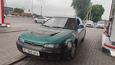 android avto: Mazda Cronos: 1996 г., 1.8 л, Механика, Бензин, Хэтчбэк — 3
