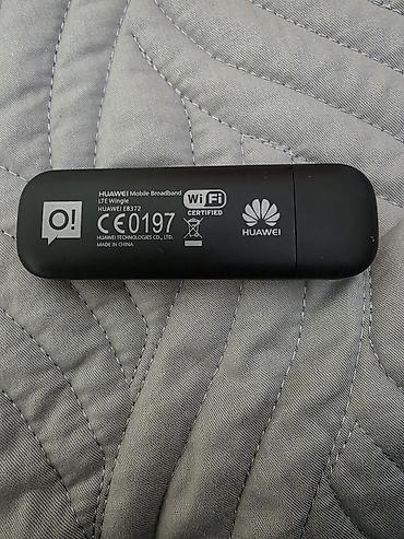 купить модем для ноутбука: Huawei E8372 (LTE Wingle) — USB‑модем/роутер с Wi‑Fi - Производитель — 2