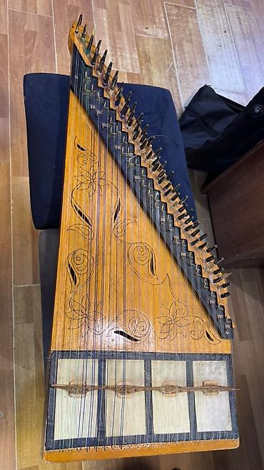 Qanun (Kanon) – milli simli musiqi aləti İşlənmiş. 1-3 siniflərə lalafo.az -da — 1 Qanun (Kanon) – milli simli musiqi aləti İşlənmiş. 1-3 siniflərə — 1