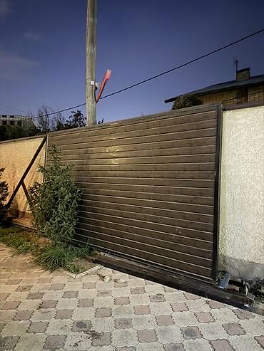 Откатные ворота: Откатные ворота из профилированной доски под дерево - Конструкция — 2