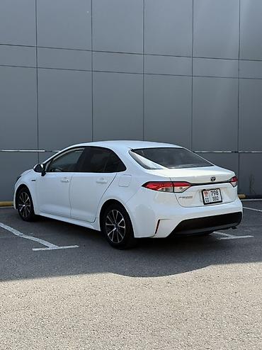 zero x neo: Toyota Corolla: 2023 г., Гибрид, Седан — 4
