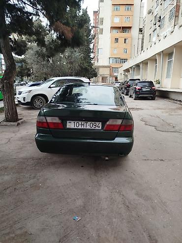byd satisi: Nissan Primera: 0.2 l | 1998 il Sedan — 5