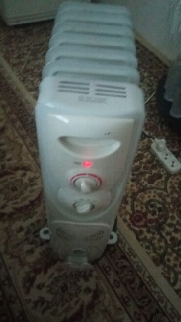 Elektrikli qızdırıcılar və radiatorlar: Cox gozel isidir qabaq terefde fufuren isdilik yeride var elave