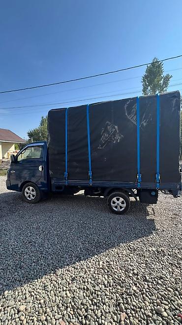 жак а4: Грузовой автомобиль Hyundai Porter с тентованным кузовом. Компактный — 9