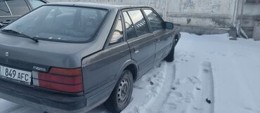 дворники авто: Mazda 626: 1986 г., 1.6 л, Механика, Газ, Хэтчбэк