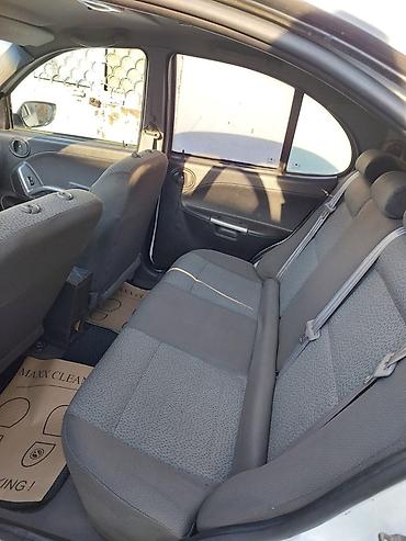 byd qin plus: Saipa Saina (sedan), ağ rəng. Masin Mastaga erazisinde yerlesir, tam — 6