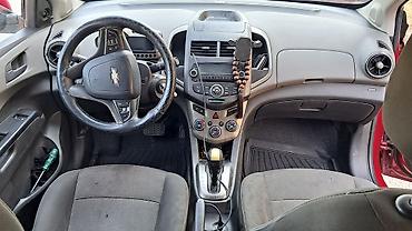 mercedes 208 d: Chevrolet Aveo sedan – qırmızı rəng, 4 qapı. Texniki və komfort — 1