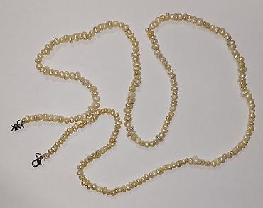 mirvari per page 40: Boyunbağı 92sm - Material: krem rəngli, düzensiz formalı təbii inci — 1