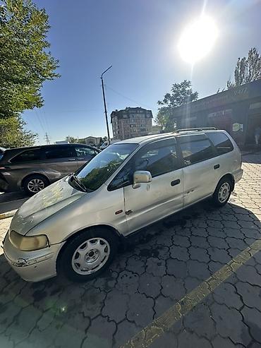 Другие детали салона: Honda — одиссей,салон минивэна. Основные особенности: - Просторный — 11