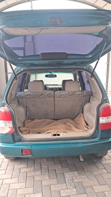 Mazda: Mazda Demio: 2000 г., 1.3 л, Механика, Гибрид, Хэтчбэк — 9