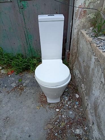 Unitazlar: Monoblok unitaz, ağ keramika korpuslu. - Üstdən düyməli su bakı ilə — 2