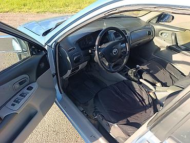 мазда 363: Mazda 323: 2003 г., 1.6 л, Механика, Бензин, Универсал — 7
