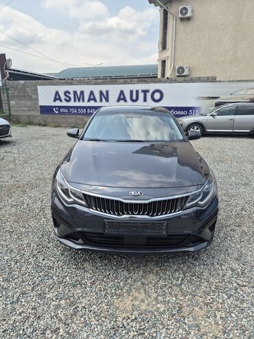 шевроле спарк 2017 цена: Автомобиль Kia K5 в сером цвете. Оснащен стильной решеткой радиатора и