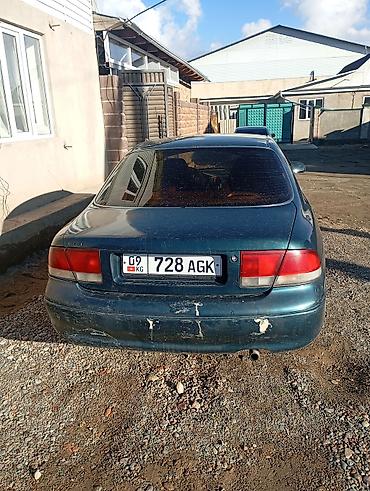 kia spektra: Mazda 323: 1993 г., Седан — 4