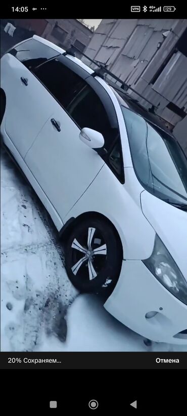 каракол транспорт: Просторный минивэн Mitsubishi Grandis белого цвета. Автомобиль оснащен