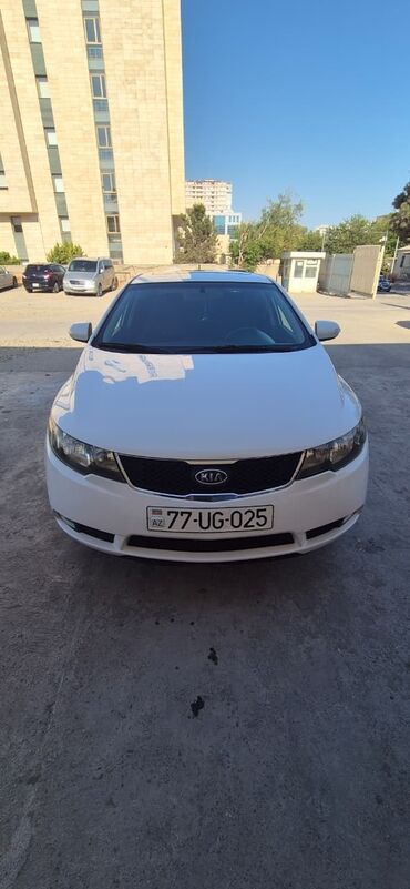 Kia Forte: 1.6 л | 2010 г. Седан