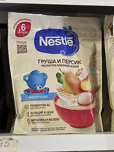 груша человек: Детская молочная мультизлаковая каша Nestlé «Груша и персик» - Для — 1