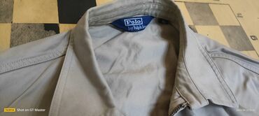 cins pencekler: Polo by Ralph Lauren brendinə məxsus bej rəngli kişi jaketi. Jaket tam