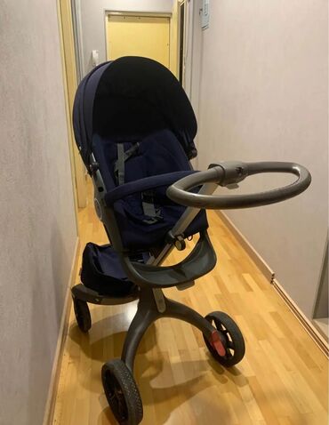 uwaq ucun: Stokke uşaq arabasi. Yaxşı vəziyyətdədir. İki lulkalidir. Həm körpənin