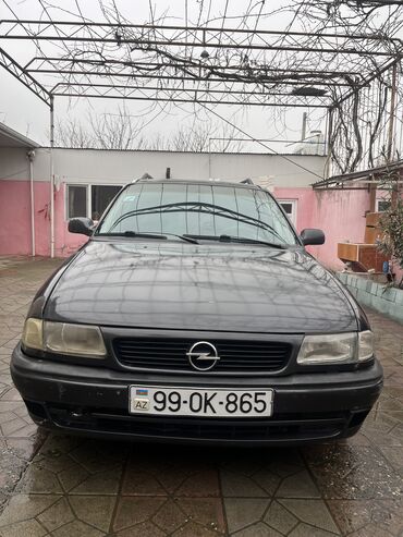 masin 011: Opel Astra: 1.6 l | 1995 il 111111 km Universal