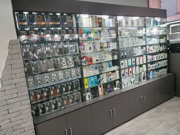 Mağazalar: Telefon magazasidir aksessuar 2 ci el telefonlae satilir vitrin