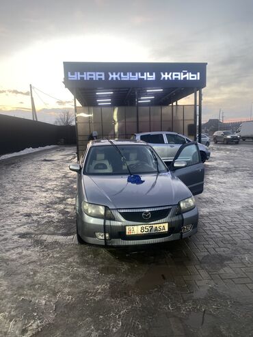 мазда три: Mazda 323: 2003 г., 1.6 л, Механика, Бензин, Хэтчбэк
