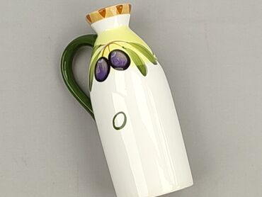 Ceramiczna butelka na oliwę z uchwytem to elegancki i praktyczny