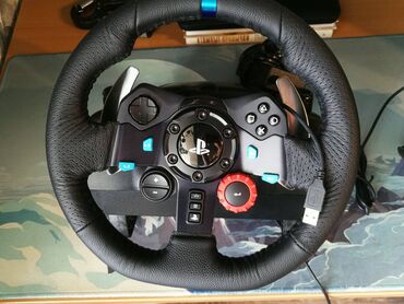 Video oyunlar üçün aksesuarlar: Logitech G29 oyun sukani. Sukan ideal veziyyetdedir, ev seraitinde