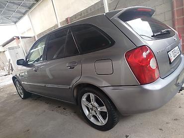 Mazda: Mazda Familia: 2003 г., Бензин, Универсал — 4