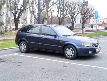 мазда 323 крыло: Mazda 323: 2001 г., 1.6 л, Механика, Газ, Хэтчбэк