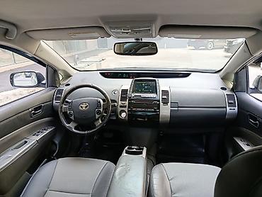 disk: Toyota Prius (2-ci nəsil) hibrid hetçbek - Rəng: açıq yaşıl/metalik - — 4