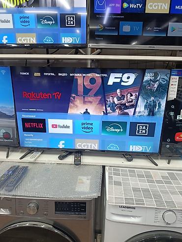 smart tv android 13: Smart TV WOO (диагональ около 55–60", тонкие рамки) на базе webOS — 1