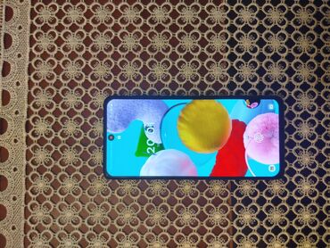samsun a54: Samsung Galaxy A51, 128 GB, Düyməli, Barmaq izi, Face ID