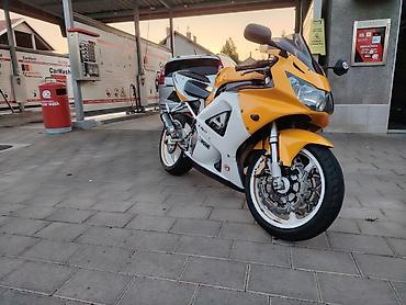 vw polo 1.4 benzin tehnicke karakteristike: Honda CBR929rr – sportski motocikl sa full oklopom u žuto-beloj — 3