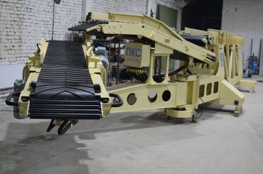 Контейнеры: Bag loader for wagons, trucks, and containers. The bag loader for