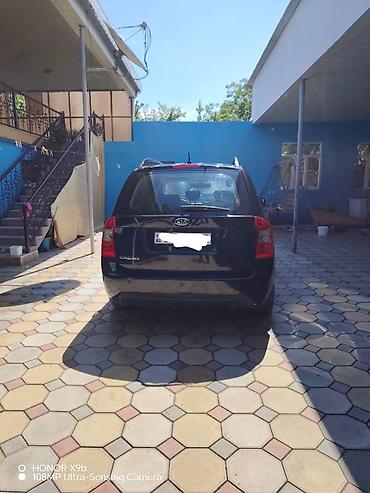 pirus bufer: Kia Carens: 0.2 l | 2008 il Sedan — 2