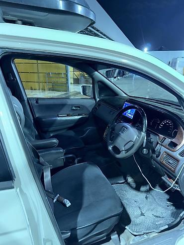 ветровик на 210: Honda Odyssey: 2000 г., 2.3 л, Автомат, Газ, Универсал — 5