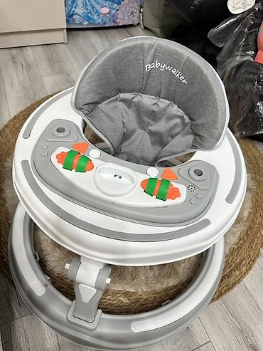 ходунки фирм: Детские ходунки Babywalker, круглой формы. - Мягкое высокое сиденье с — 1