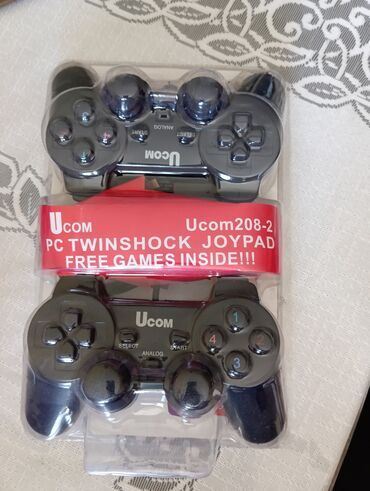 oyun konsolu ucuz: Joypad yeni. 25 azn. magaza baglanib. mehsullar maya dəyərinə