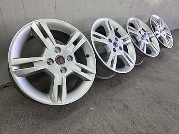 dim staklo: ALUMINIJUMSKE FELNE FIAT GRANDE PUNTO 15 4 X 100 | Fiat Grande Punto — 2
