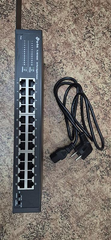 Модемы и сетевое оборудование: Коммутатор TP-Link TL-SG1024D. состояния нового 1 штук цена — 2