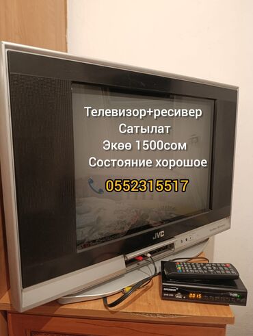 купить антенну для цифрового тв: ЭЛТ-телевизор JVC с плоским экраном и черным корпусом, дополненным