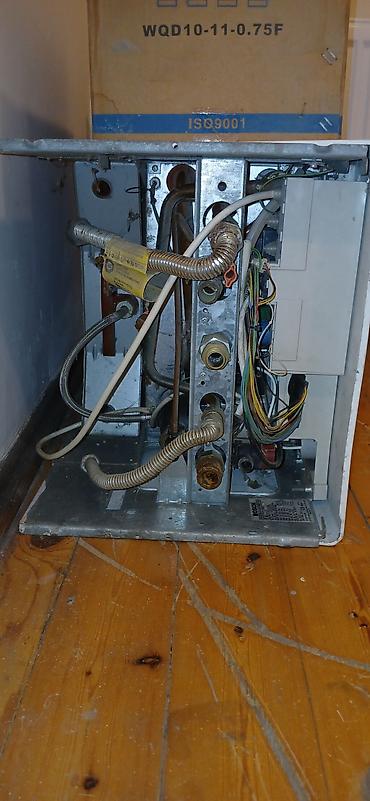 evde sam yandirmaq: Bosch divar tipli qaz kombisi Model: BOSCH ZWA 24-1 APM (etiketdə: B1 — 5
