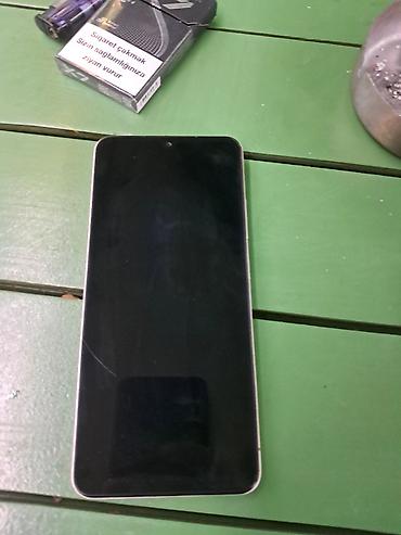 redmi 5a: Redmi A5, 128 GB, rəng - Qızılı, Sensor, Barmaq izi, Face ID — 4