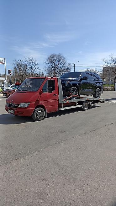 Услуги эвакуатора: С лебедкой, С ломаной платформой — 10