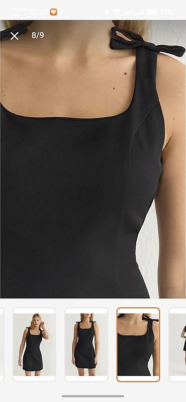 Qara mini paltar - Klassik “little black dress” – düz kəsim, bədənin