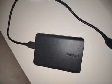 Tulumlar: Məhsul paketi: 1) Toshiba portativ xarici hard disk Üstünde de 4 oyun