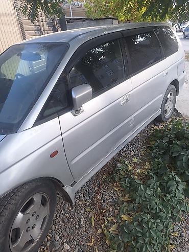 210 2 7: Honda Odyssey: 1999 г., 2.3 л, Вариатор, Бензин, Минивэн — 3